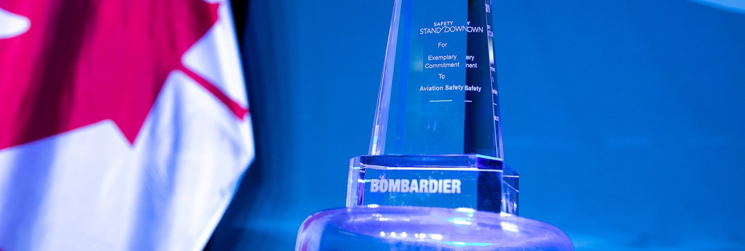 safety standdown award in front of blue background and canadian flag